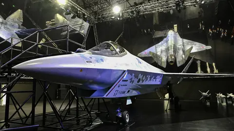 HANDOUT - 20 July 2021, Russia, Zhukovsky: A general view of models of a new light tactical single-engine jet fighter at the Sukhoi pavilion of the MAKS-2021 International Aviation and Space Salon. Photo: -/Kremlin/dpa - ATTENTION: editorial use only and only if the credit mentioned above is referenced in full