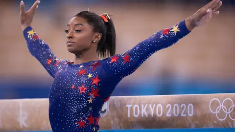 25 July 2021, Japan, Tokyo: USA's Simone Biles reacts after finishing her routine on the balance beam as part of the women's artistic gymnastics qualification at the the Ariake Gymnastics Centre during the Tokyo 2020 Olympic Games. Photo: Paul Kuroda/ZUMA Press Wire/dpa
