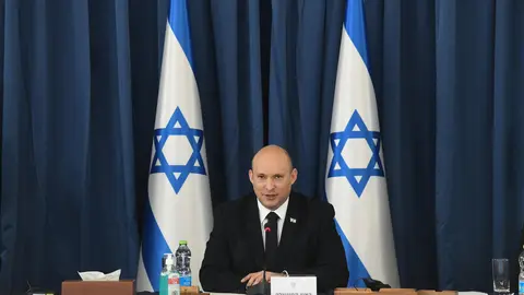 HANDOUT - 25 July 2021, Israel, Jerusalem: Israeli Prime Minister Naftali Bennett speaks during the weekly Israeli cabinet meeting. Photo: Amos Ben-Gershom/GPO/dpa - ATTENTION: editorial use only and only if the credit mentioned above is referenced in full