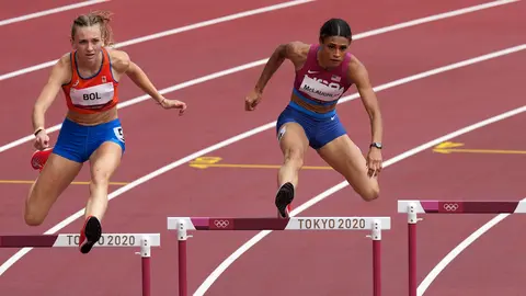 04 August 2021, Japan, Tokyo: USA's Sydney McLaughlin (R) and Netherlands' Femke Bol compete in the Women's 400m Hurdles final of the athletics competition, at the Olympic Stadium during the Tokyo 2020 Olympic Games. Photo: Martin Rickett/PA Wire/dpa