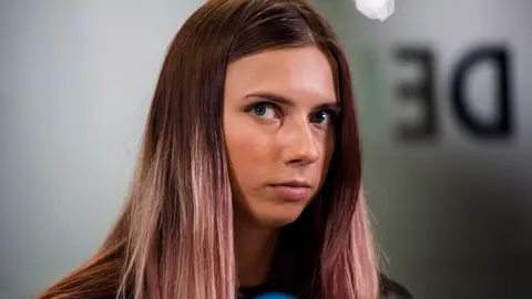 05 August 2021, Poland, Warsaw: Belarusian sprinter Krystsina Tsimanouskaya speaks during a press conference in Warsaw after arriving on Wednesday evening. Timanovskaya was allegedly kidnapped by the Belarusian authorities in Tokyo in an attempt to force her to fly back to Belarus from the Olympic Games following comments she had made on social media criticizing the Belarusian coaches. Photo: Attila Husejnow/SOPA Images via ZUMA Press Wire/dpa