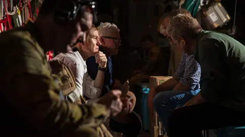 17 August 2021, Afghanistan, Kabul: Australian citizens sit inside a Royal Australian Air Force (RAAF) C-130 Hercules aircraft. The first Australian Defence Force evacuation flight has departed Kabul from Hamid Karzai International Airport with 26 evacuees on board. Photo: -/AUSTRALIAN DEFENCE FORCE via AAP/dpa