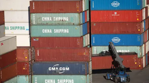 FILED - A container forklift is on the move at Hamburg Hafen und Logistik AG's (HHLA) Container Terminal Tollerort (CTT). Photo: Christian Charisius/dpa