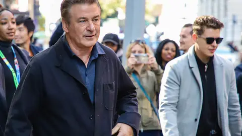 FILED - 21 October 2019, US, New York: American actor Alec Baldwin (L) is seen in New York's Soho neighborhood. The director of photography on a movie starring Alec Baldwin has been killed and the film's director injured, they were shot by a prop firearm that was discharged by Baldwin, who is also a producer on the film. Photo: Vanessa Carvalho/ZUMA Wire/dpa