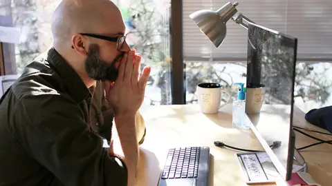 Man-computer-work-table-desk-by-Pixabay