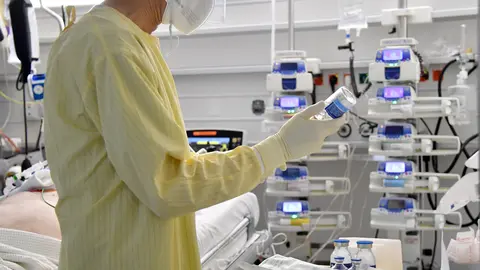 A hospital worker cares for a Covid-19 patient in a Salzburg, Austria, hospital. Austria is facing another nationwide lockdown, according to several local media reports. Photo: Barbara Gindl/dpa.
