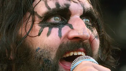 FILED - 17 August 2002, Weeze: Hank von Helvete, frontman of the Norwegian death punk music group 'Turbonegro', performs during the 16th Bizarre Festival in Weeze. Hans-Erik Dyvik Husby died on Saturday aged 49. Photo: Rolf Vennenbernd/dpa.