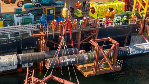 FILED - Experts on board the laying vessel "Fortuna" connect pipes of the Nord Stream 2 pipeline via water in the Baltic Sea. Photo: Nord Stream 2/dpa - ATTENTION: editorial use only in connection with the latest coverage and only if the credit mentioned above is referenced in full.