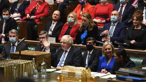HANDOUT - 24 November 2021, United Kingdom, London: UK Prime Minister Boris Johnson speaks during the Prime Minister's Questions in the House of Commons. Photo: Jessica Taylor/Uk Parliament via PA Media/dpa - ATTENTION: editorial use only and only if the credit mentioned above is referenced in full.