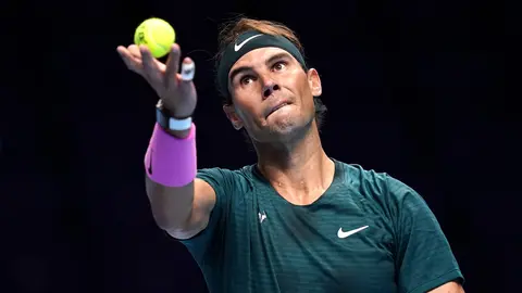 FILED - 15 November 2020, United Kingdom, London: Spanish tennis player Rafael Nadal in action against Russia's Andrey Rublev during day one of the Nitto ATP Finals at The O2 Arena, London. Rafael Nadal has tested positive for coronavirus in a development that could throw his Australian Open participation further into doubt. Photo: John Walton/PA Wire/dpa.