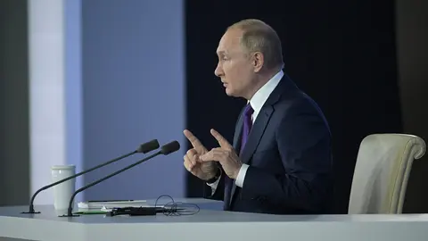 HANDOUT - 23 December 2021, Russia, Moscow: Russian President Vladimir Putin holds his annual End-of-year press conference in Moscow. Photo: -/Kremlin/dpa - ATTENTION: editorial use only and only if the credit mentioned above is referenced in full.