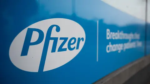 FILED - 23 January 2021, Berlin: Pfizer's logo is seen displayed at one of its corporate offices. Britain's Medicines and Healthcare products Regulatory Agency (MHRA) said on Friday that it has approved Pfizer's Oral Covid-19 antiviral medicine, Paxlovid, for people with mild to moderate Covid-19 who are at high risk of developing severe cases. Photo: Christophe Gateau/dpa.