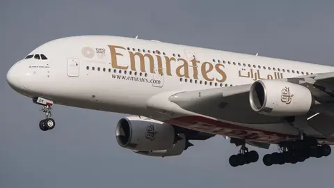 FILED - An Airbus A-380 from Emirates lands at Frankfurt Airport. Emirates will start operating limited flights next week to carry foreigners looking to leave the United Arab Emirates, the company's head said on Thursday. Photo: Boris Roessler/dpa.