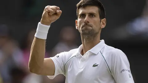 FILED - 11 July 2021, United Kingdom, London: Serbian tennis player Novak Djokovic reacts during his Men's Final tennis match against Italy's Matteo Berrettini during Wimbledon Tennis tournament. Djokovic won a legal victory in his bid to avoid deportation from Australia and compete for a record 21st Grand Slam tennis title. Photo: Simon Bruty/Aeltc Pool/PA Wire/dpa.