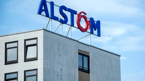 FILED - 30 March 2017, Lower Saxony, Salzgitter: The logo of rail technology manufacturer Alstom is seen on top of its administration building. Alstom said on Tuesday that it has signed a 1.8-billion-euro (2.04-billion-dollar) framework contract with Norske Tog AS, a provider of transit services, to supply up to 200 Coradia Nordic regional trains in Norway. Photo: Hauke-Christian Dittrich/dpa.