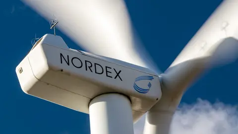 FILED - 20 March 2018, Brandenburg, Karstaedt: Wind turbines of the company Nordex rotate in a wind farm near Karstaedt. German wind turbine maker Nordex said on Tuesday that it has received an order for 380 MW wind turbines from Finnish utility company Fortum, in Nordex's first order from Fortnum. Photo: Jens Büttner/dpa-Zentralbild/dpa.