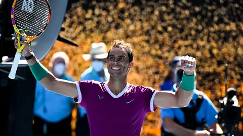 17 January 2022, Australia, Melbourne: Spanish tennis player Rafael Nadal reacts after winning his First Round Men's Singles tennis match against USA's Marcos Giron on Day 1 of the 2022 Australian Open at Melbourne Park. Photo: Dave Hunt/AAP/dpa.
