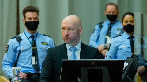 19 January 2022, Norway, Skien: Anders Behring Breivik (2nd L), convicted of terrorism after killing 77 people in July 2011, attends the second day of trial in the temporary courtroom at Skien Prison, where his application for early release is being heard by the Telemark District Court. Photo: Ole Berg-Rusten/NTB/dpa.
