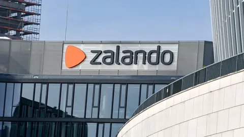 FILED - 03 March 2021, Berlin: The logo of the online retailer Zalando at the headquarters of the Zalando Campus at Mercedes-Platz. The Berlin-based online fashion retailer Zalando said it had decided to initiate a share buy-back programme. Photo: Jens Kalaene/dpa-Zentralbild/dpa.