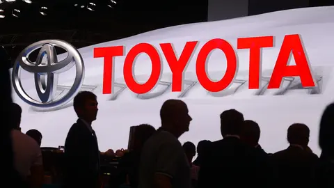 FILED - 10 September 2013, Hessen, Frankfurt_Main: Toyota logo is seen during the press day for the Frankfurt Motor Show (IAA) in Frankfurt Main, Germany. Toyota sold 10.5 million vehicles in 2021, a 10.1-per-cent jump from its sales in 2020 that sees the Japanese carmaker pulling farther ahead of its nearest rival Volkswagen. Photo: picture alliance / dpa.