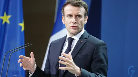 FILED - 25 January 2022, Berlin: French President Emmanuel Macron speaks during a press conference with German Chancellor Olaf Scholz (Not Pictured) ahead of their meeting. Macron is due to call his Russian counterpart Vladimir Putin on Friday in an attempt to de-escalate the conflict with Ukraine, amid Western fears that Moscow may be planning an invasion. Photo: Kay Nietfeld/dpa-Pool/dpa.