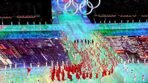 04 February 2022, China, Beijing: Team China takes part in the Parade of Nations during the opening ceremony of the Beijing 2022 Winter Olympic Games at the Beijing National Stadium in China. Photo: Andrew Milligan/PA Wire/dpa.