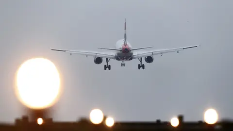 FILED - 19 December 2016, United Kingdom, Crawley: A plane lands at Gatwick Airport who has announced it will reopen its south terminal next month, to meet expected strong demand for air travel this summer. Photo: Gareth Fuller/PA Wire/dpa.