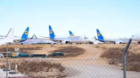 15 February 2022, Spain, Vilanova D'alcolea: The five Ukrainian Boeign 737-800 aircraft that landed at Castellon airport in light of the political situation in Ukraine and Russia. Following US warnings of a possible imminent start of war, Ukrainian carrier Ukraine International Airlines (UIA) has had aircraft brought out of the country. Photo: Carme Ripollés/EUROPA PRESS/dpa.