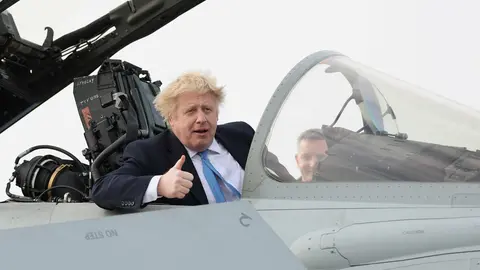 17 February 2022, United Kingdom, Waddington: UK's Prime Minister Boris Johnson sits a military plane during his visit to meet military personnel at Royal Air Force Station Waddington. Photo: Carl Recine/PA Wire/dpa