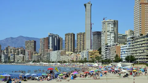 A general view of Benidorm, with its beach full of people. Photo: Pixabay.