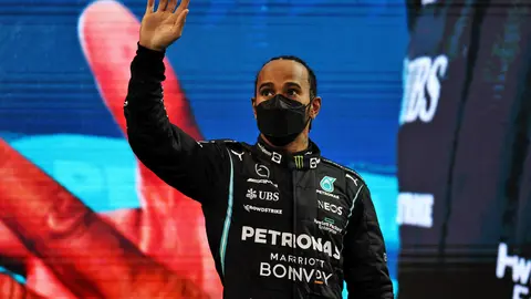 FILED - 12 December 2021, United Arab Emirates, Abu Dhabi: Second-placed British Formula One driver Lewis Hamilton of Team Mercedes looks dejected following the Abu Dhabi Formula One Grand Prix at the Yas Marina Circuit. Hamilton says he is ready to fight for titles in the coming season after working through the controversial loss of the drivers' championship in the final race of last year. Photo: -/PA Wire/dpa.