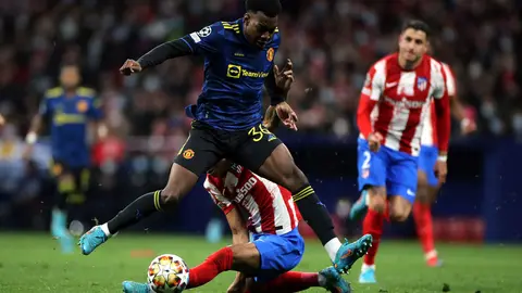 23 February 2022, Spain, Madrid: Manchester United's Anthony Elanga (C) in action during the UEFA Champions League round of 16 first leg soccer match between Atletico Madrid and Manchester United at Wanda Metropolitano. Photo: Isabel Infantes/PA Wire/dpa.