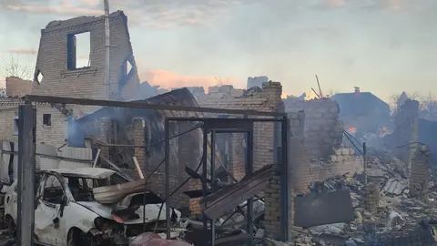 27 February 2022, Ukraine, Bucha: A view of houses destroyed by Russian army shelling. Russia launched a full-scale attack on Ukraine on Thursday, 24 February 2022, shelling cities and bases with airstrikes or shells. Photo: -/Ukrinform/dpa.