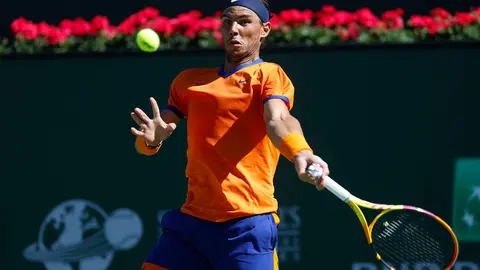 14 March 2022, US, Indian Wells: Spainsh tennis player Rafael Nadal returns a shot against UK's Daniel Evans during their Men's Singles Round of 32 Tennis match of the Indian Wells Masters tennis tournament at Indian Wells Tennis Garden. Photo: Charles Baus/CSM via ZUMA Press Wire/dpa.