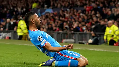 15 March 2022, United Kingdom, Manchester: Atletico Madrid's Renan Lodi celebrates scoring his side's first goal during the UEFA Champions League round of sixteen second leg soccer match between Manchester United and Atletico Madrid at Old Trafford. Photo: Martin Rickett/PA Wire/dpa.