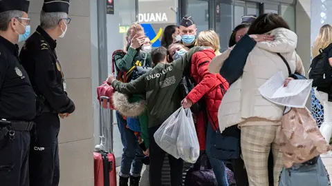 12 March 2022, Spain, Valencia: Relatives living in Valencia welcome Ukrainian refugees upon their arrival at Manises airport. Photo: Jorge Gil/EUROPA PRESS/dpa.