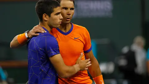 19 March 2022, US, Indian Wells: Spanish tennis player Rafael Nadal (R) is congratulated by Spain's Carlos Alcaraz after their Men's Singles Semi-final Tennis match of the Indian Wells Masters tennis tournament at Indian Wells Tennis Garden. Photo: Charles Baus/CSM via ZUMA Press Wire/dpa.
