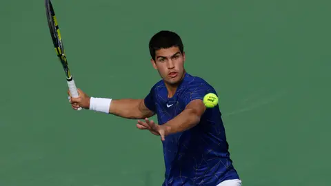 19 March 2022, US, Indian Wells: Spanish tennis player Carlos Alcaraz in action against Spain's Rafael Nadal during their Men's Singles Semi-final Tennis match of the Indian Wells Masters tennis tournament at Indian Wells Tennis Garden. Photo: Charles Baus/CSM via ZUMA Press Wire/dpa.