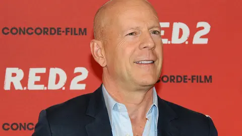 FILED - 24 July 2013, Munich: US actor Bruce Willis poses during a photocall for his new film 'R.E.D.2' at Hotel Manadrin Oriental in Munich. Willis is suffering from a medical condition that is affecting his cognitive abilities and will be taking a break from acting, his family shared Wednesday. Photo: picture alliance / dpa.