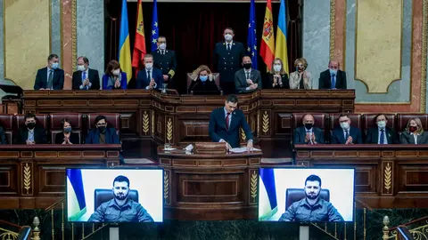 05 April 2022, Spain, Madrid: Spanish Prime Minister Pedro Sanchez listens to the speech of the Ukrainian President Volodymyr Zelensky to the Spanish deputies and senators via video transmission at the Congress of Deputies. Photo: R.Rubio.Pool/EUROPA PRESS/dpa.