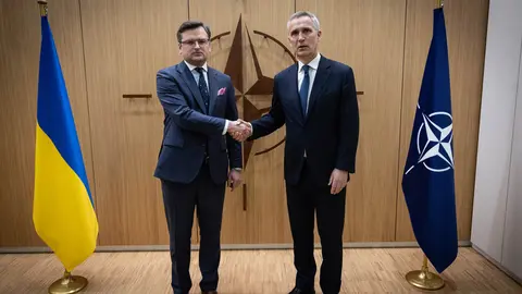 HANDOUT - 07 April 2022, Belgium, Brussels: NATO Secretary General Jens Stoltenberg (R) receives Ukrainian Foreign Minister Dmytro Kuleba prior to their meeting on the sidelines of the meetings of the NATO Ministers of Foreign Affairs. Photo: -/NATO/dpa - ATTENTION: editorial use only and only if the credit mentioned above is referenced in full.