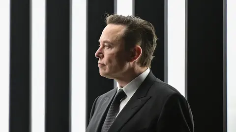 FILED - 22 March 2022, Brandenburg, Gruenheide: Elon Musk, Tesla CEO, attends the opening of the Tesla factory Berlin Brandenburg. Musk assured European Internal Market Commissioner Thierry Breton on Monday that he intends to comply with new EU content moderation rules ahead of his impending takeover of Twitter. Photo: Patrick Pleul/dpa-Zentralbild POOL/dpa.