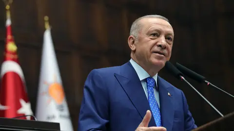 HANDOUT - 18 May 2022, Turkey, Ankara: Turkish President Recep Tayyip Erdogan speaks during the Justice and Development Party's parliamentary group meeting at the Grand National Assembly of Turkey. Photo: -/Turkish Presidency/dpa - ATTENTION: editorial use only and only if the credit mentioned above is referenced in full.