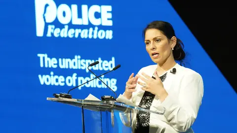 17 May 2022, United Kingdom, Manchester: UK Home Secretary Priti Patel speaks during a Q&A session at the annual conference of the Police Federation of England and Wales inside the Central Convention Complex. Photo: Danny Lawson/PA Wire/dpa.