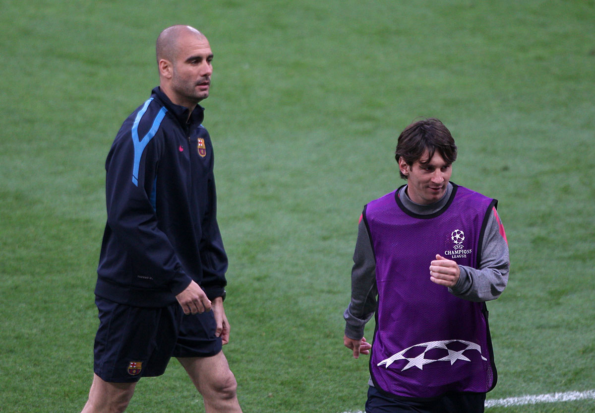 FILED - 27 May 2011, England, London: Pep Guardiola (L), then Barcelona head coach and his Barcelona's Lionel Messi take part in a training session. Messi has communicated to Barcelona via fax that he wants to leave the club on a free transfer this summer, according to media reports in Spain. Photo: Nick Potts/dpa.