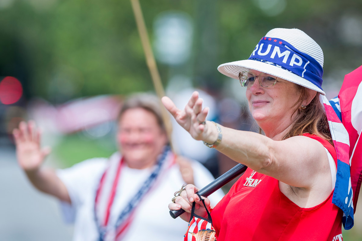 24 August 2020, US, Charlotte: A supporter of the US President Donald Trump takes part in rally during the opening day of the Republican National Convention. Photo: Sean Meyers/dpa.