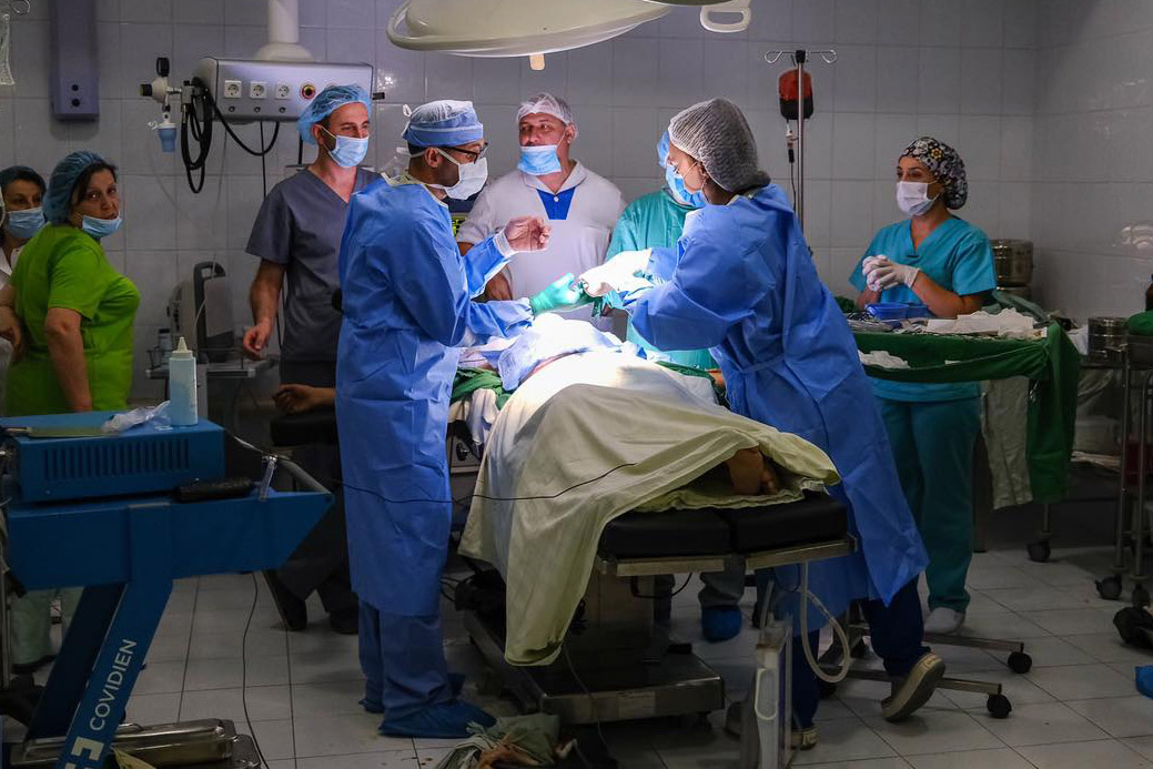 HANDOUT - 28 September 2020, Azerbaijan, Stepanakert: Medical personnel operate on a person who was allegedly wounded in a shelling on Stepanakert, the capital city of the self-proclaimed Republic of Nagorno-Karabakh, also known as Artsakh. Heavy fighting has broken out in the disputed Nagorno-Karabakh region in the southern Caucasus between neighbouring Azerbaijan and Armenia on Sunday. Photo: -/Armenian Foreign Ministry/dpa.