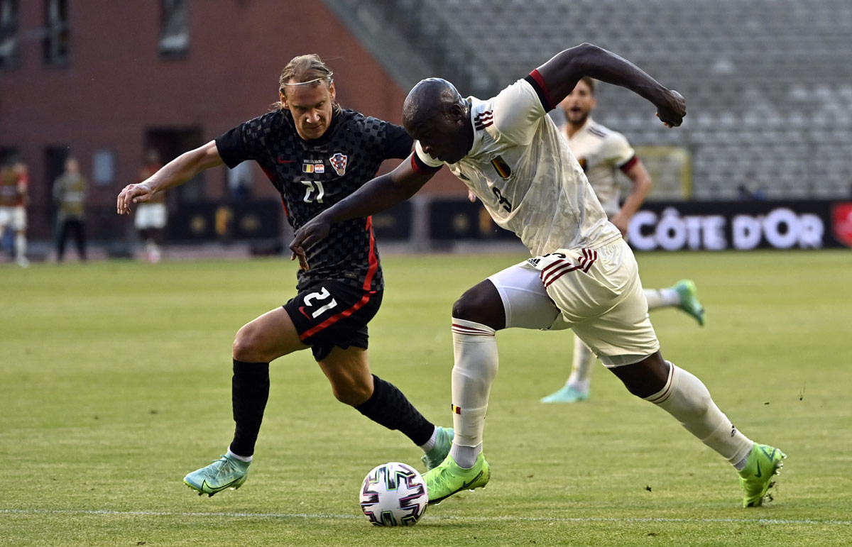 06 June 2021, Belgium, Brussels: Croatia's Domagoj Vida and Belgium's Romelu Lukaku battle for the ball during the International Friendly soccer match between Belgium and Croatia at the King Baudouin Stadium. Photo: Dirk Waem/BELGA/dpa