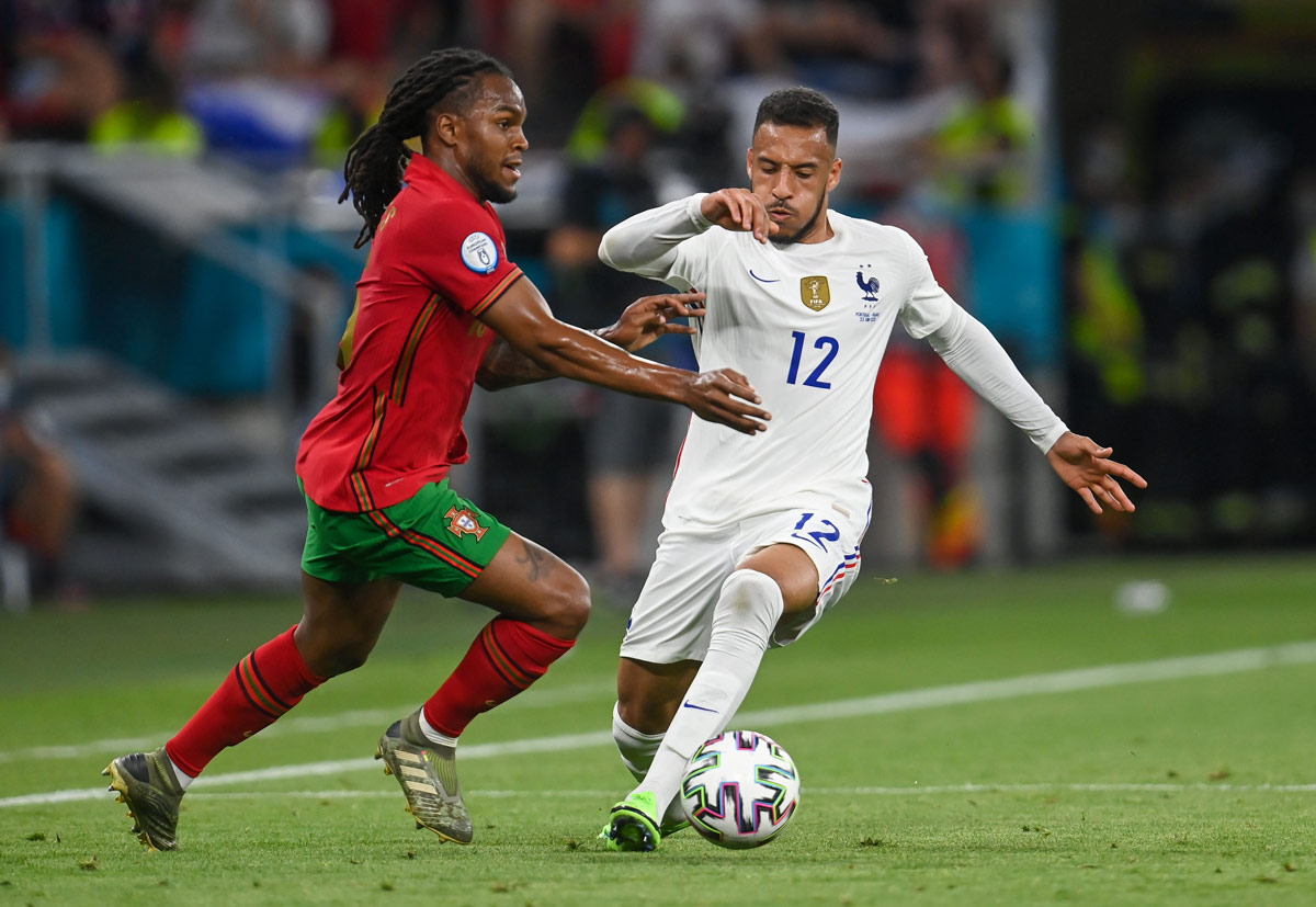 23 June 2021, Hungary, Budapest: Portugal's Renato Sanches (L) and France's Corentin Tolisso battle for the ball during the UEFA EURO 2020 Group F soccer match between Portugal and France at the Puskas Arena. Photo: Robert Michael/dpa-Zentralbild/dpa.