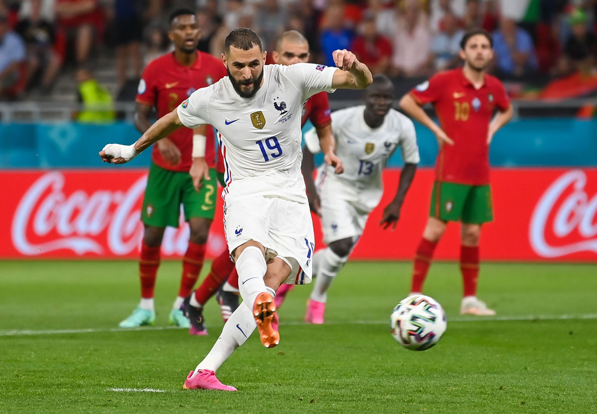 23 June 2021, Hungary, Budapest: France's Karim Benzema scores his side's first goal during the UEFA EURO 2020 Group F soccer match between Portugal and France at the Puskas Arena. Photo: Robert Michael/dpa-Zentralbild/dpa.